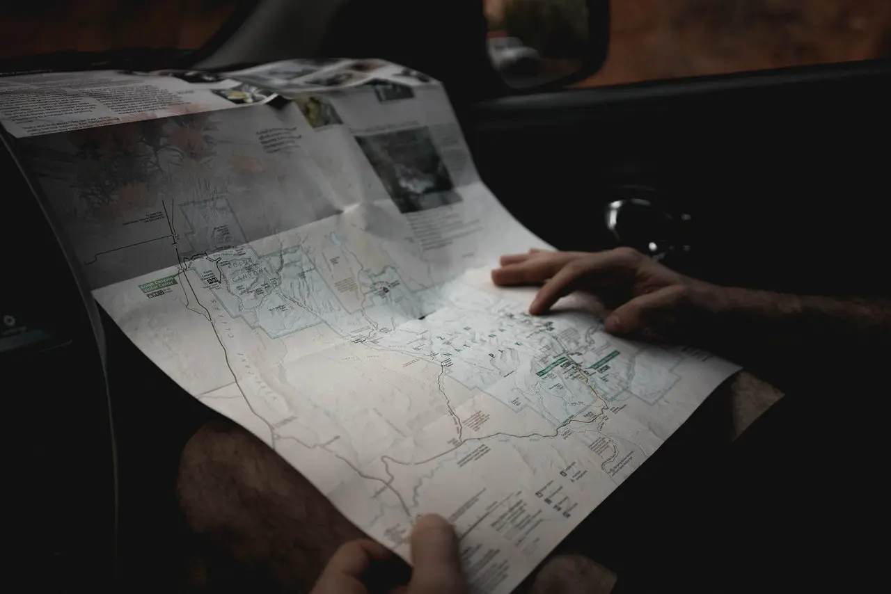 person holding map